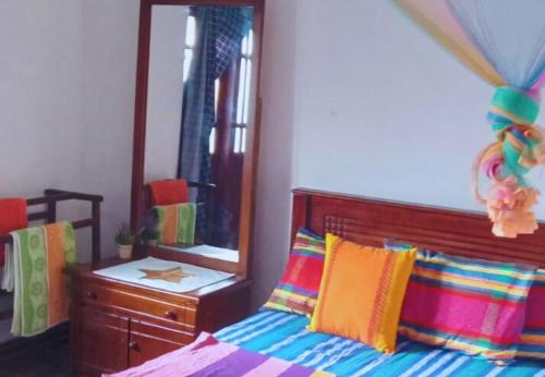 Postel nebo postele na pokoji v ubytování Q3 Homestay