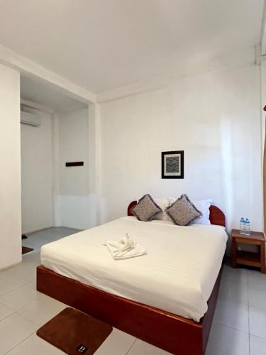 Postel nebo postele na pokoji v ubytování Sanhak Guesthouse 1