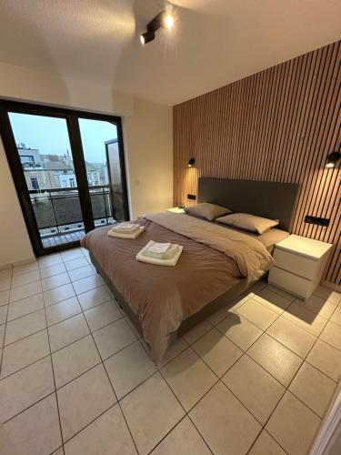 Postel nebo postele na pokoji v ubytování C- view Palace