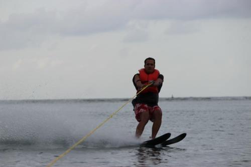 a man on water skis being pulled by a rope at Hospedaje Yarisnori in Bocas del Toro