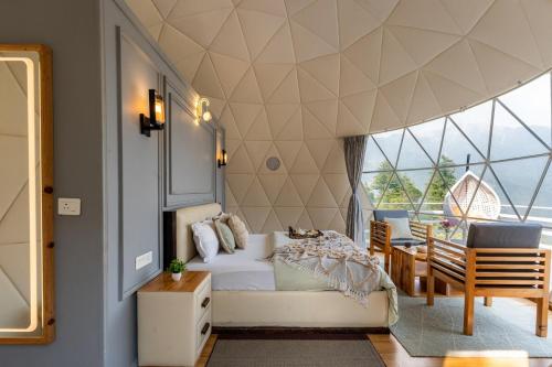 Posezení v ubytování Nature's Dome Hideaway By Bastiat Stays