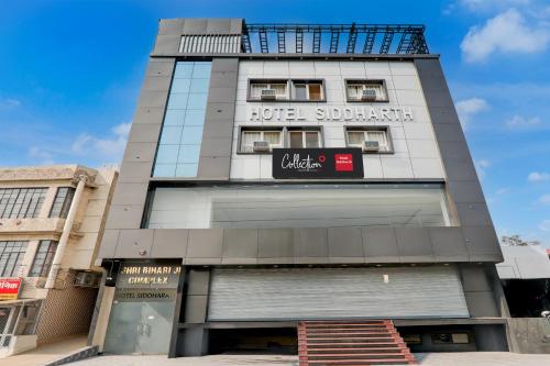 a building with a sign that reads hotel subhashosa at Collection O Siddharth Near A to Z Electronics in Kānpur