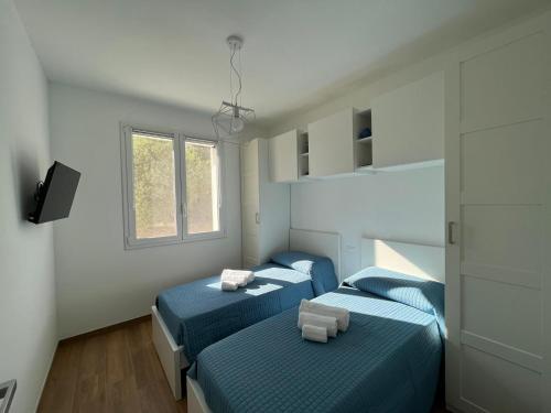 Кровать или кровати в номере Giglio Bianco Casa Vacanze