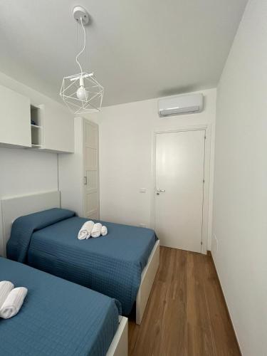 Кровать или кровати в номере Giglio Bianco Casa Vacanze