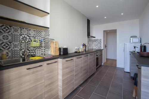 a kitchen with a sink and a counter top at T3 lumineux à 2 pas de la gare in Marseille