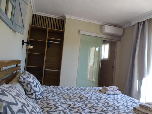 Ένα ή περισσότερα κρεβάτια σε δωμάτιο στο B&B Casa Sarandy