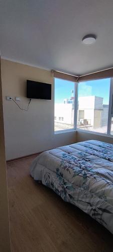 Postel nebo postele na pokoji v ubytování departamento céntrico amplio y cómodo