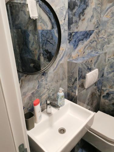 Un baño de BG Exclusive Suites