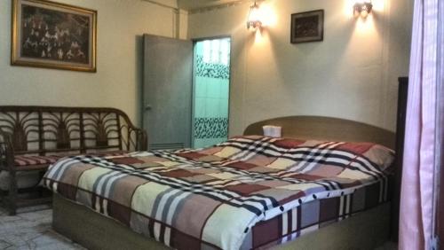 Postel nebo postele na pokoji v ubytování Tientong Guesthouse