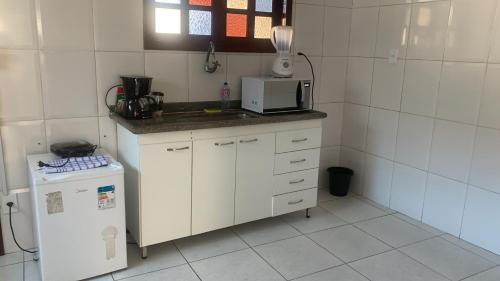 Dapur atau dapur kecil di Quarto estrela do mar
