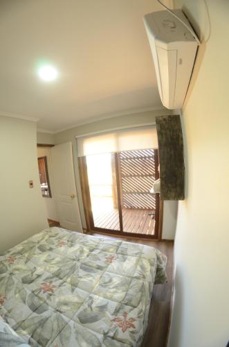 Ein Bett oder Betten in einem Zimmer der Unterkunft Arenas Pullay