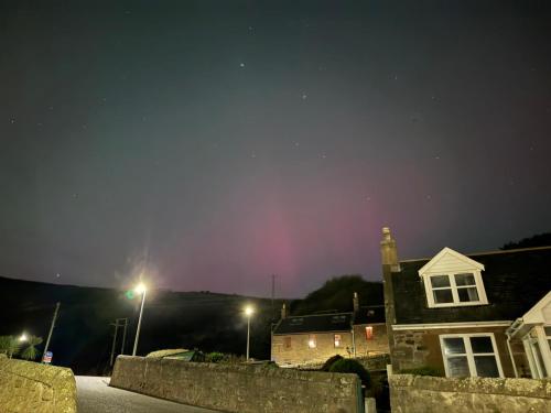 a night view of a house and street lights at Gowan Bank in Gourdon