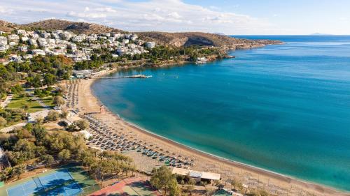 an aerial view of a beach and the ocean at Athenian Riviera Hotel& Suites in Athens