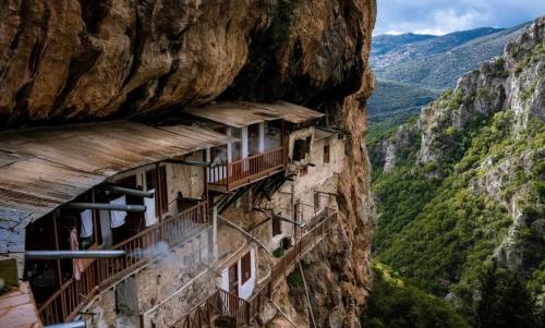a building on the side of a mountain at Terra Petra Villa at Psari Trikolonon Gortynia in Psárion
