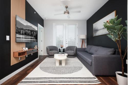 a living room with a couch and a table at 1BR Oasis w Pool&Parking, Near Rvrwlk & Conv Ctr in San Antonio