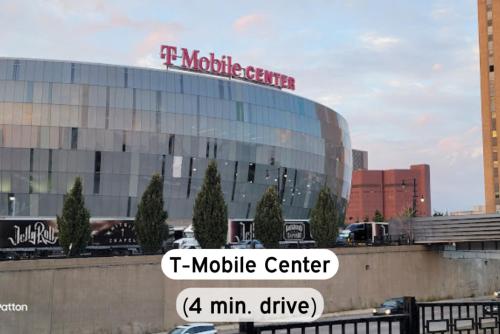a large building with a molnar center on top of it at Chic 1BR Parking, Rooftop, Near Arrowhd & TMobile in Kansas City