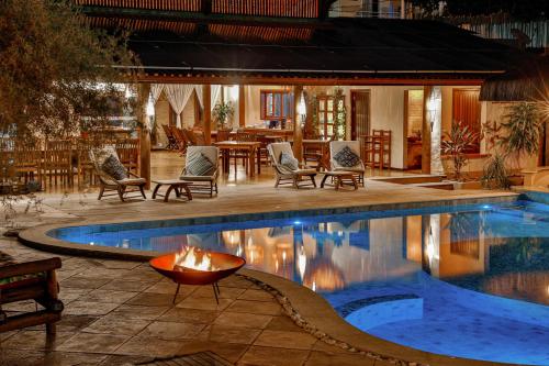 A piscina localizada em Paraíso Ecológico Pousada & SPA ou nos arredores