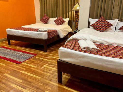 Cama o camas de una habitación en Gorkha Heritage Home