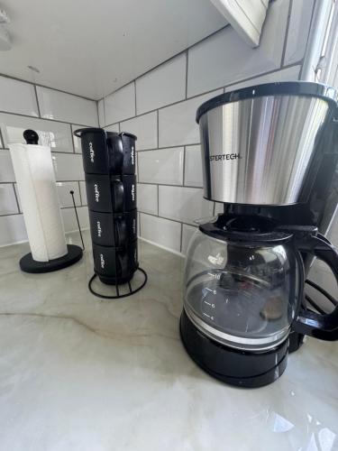 a blender sitting on a counter in a kitchen at Villa La Mer Ocean View Marisule Ridge in Gros Islet