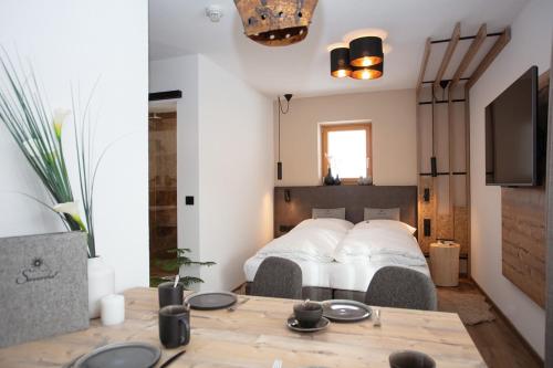 Ένα ή περισσότερα κρεβάτια σε δωμάτιο στο Apartmenthaus Sonnenhof