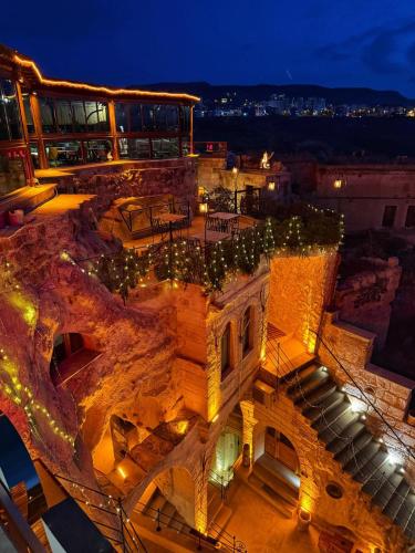 an aerial view of a building at night at My Cave Suites in Nevsehir