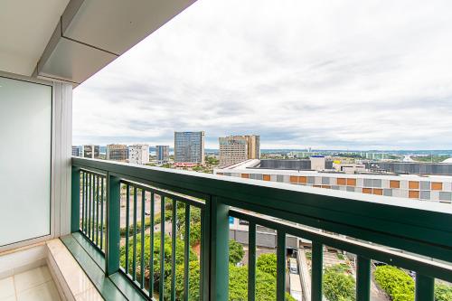 a balcony with a view of the city at Vision Hotel em Brasília 60613 in Brasilia