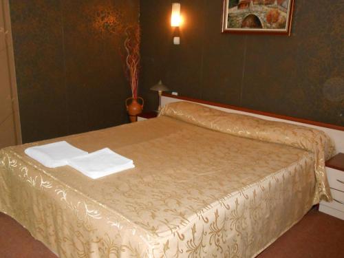 Katil atau katil-katil dalam bilik di Hotel Kapri