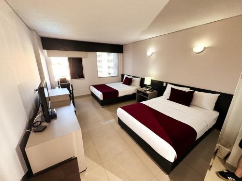Katil atau katil-katil dalam bilik di Hotel Tonchalá
