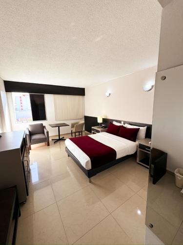 Katil atau katil-katil dalam bilik di Hotel Tonchalá