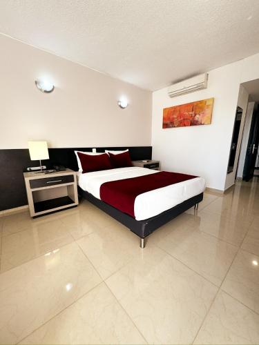 Katil atau katil-katil dalam bilik di Hotel Tonchalá