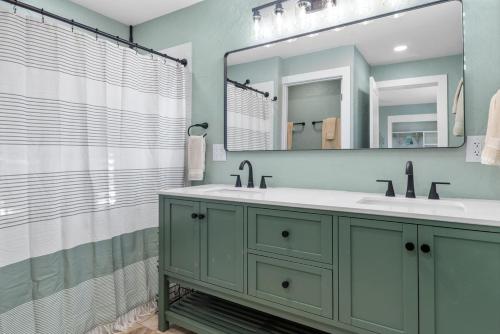 a bathroom with a sink and a mirror at Custer Gem in Custer