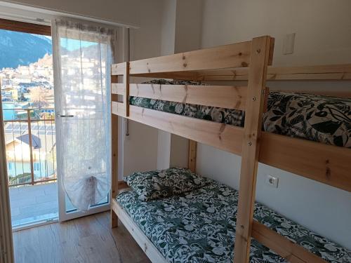 Postel nebo postele na pokoji v ubytování Appartamento Villa Ida