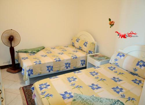 Postelja oz. postelje v sobi nastanitve Ras El Bar Apartments Armed Forces