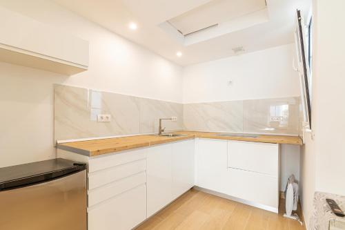 Kuchyň nebo kuchyňský kout v ubytování Garden House - La Isleta