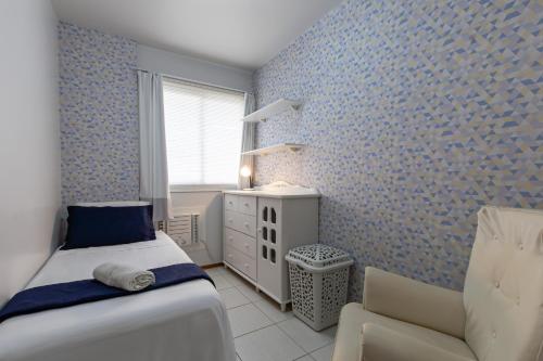 Katil atau katil-katil dalam bilik di Apartamento Família em bairro nobre de Cuiabá!