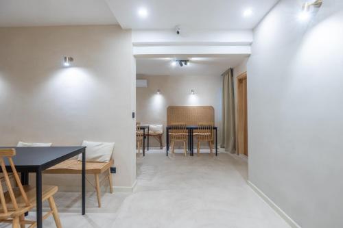 a dining room with a table and chairs at lo͝or luxury retreat in Split