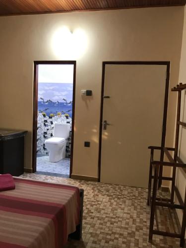 Llit o llits en una habitació de Villa Rodrigo Lite