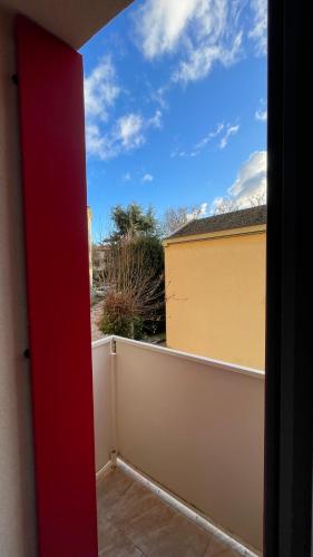 a view from a door of a fence at Casa Laguna Escape in Mestre