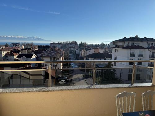a view of a city from a balcony at Hotel Majestic in Struga