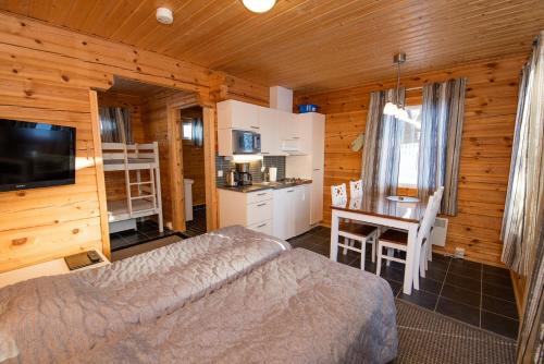 Kuchyň nebo kuchyňský kout v ubytování Kajaani Cottages