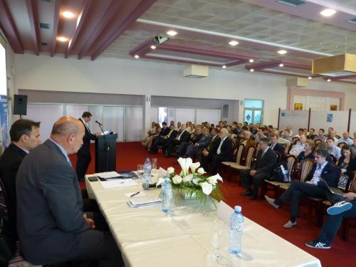 a large group of people sitting at tables in a room at Prenociste Gazela in Pirot