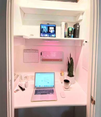 a laptop computer sitting on a desk in a room at Modern and Private Cabin in the Woods in Carnelian Bay