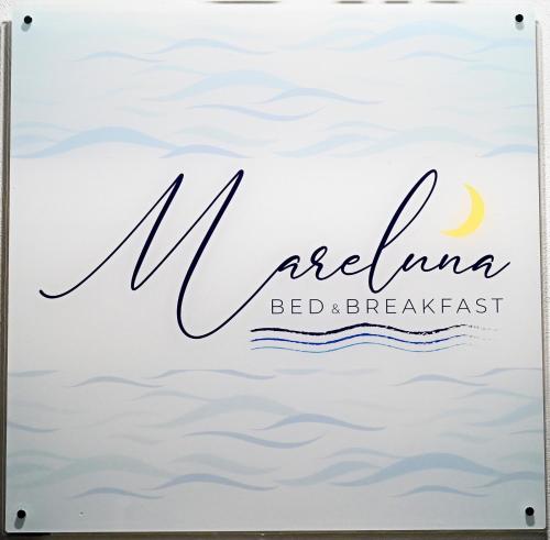 a sign for a restaurant aloha bed and breakfast on the water at B&B MareLuna in Angri