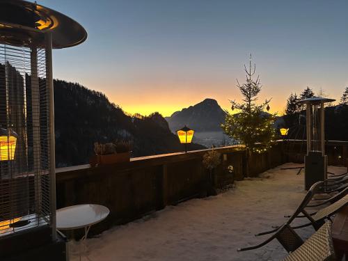 a balcony with a view of the mountains at Veitenhof im Kaisertal, nur nach 30 minütigem Spaziergang erreichbar, only after 30 minutes walk reachable in Ebbs