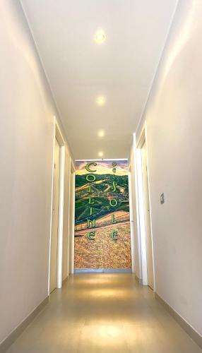 an empty hallway with a painting on the wall at Colline del sole in San Salvo