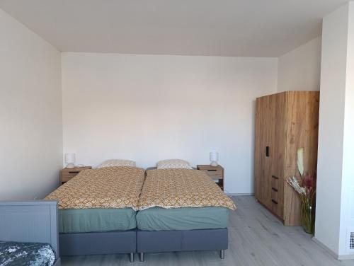 Postel nebo postele na pokoji v ubytování apartmán Fénix
