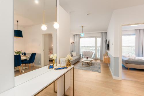 Ένα ή περισσότερα κρεβάτια σε δωμάτιο στο POLANKI AQUA CLASSIC Familly with free pool & wellness