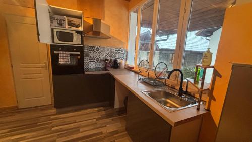 Η κουζίνα ή μικρή κουζίνα στο Idéal we, vacances travail