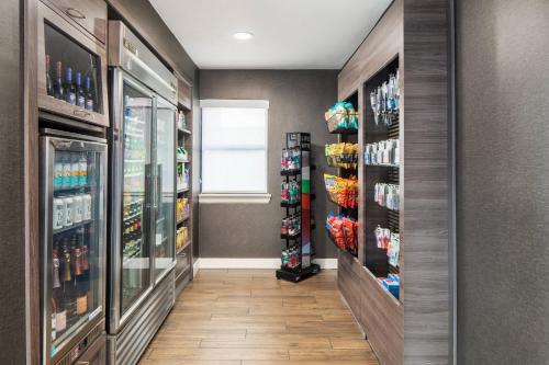 a pharmacy aisle with a large amount of drinks at Residence Inn San Diego La Jolla in San Diego