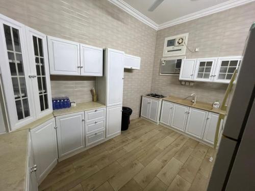 Η κουζίνα ή μικρή κουζίνα στο نزل الرحاب -للعائلات فقط-